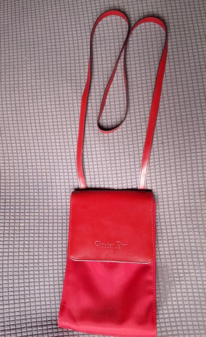 Preloved Christian Dior Mini sling bag (Category: Purses & Pouches) located in Alicia. Submitted by celynahambotruecelyna39 (Listing ID 1469818121, Image 1). Description: in good condition normal sign of use,for phone,and wallet.