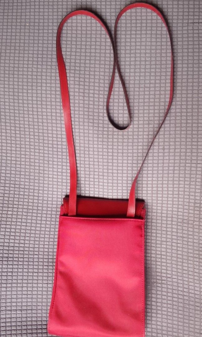 Preloved Christian Dior Mini sling bag (Category: Purses & Pouches) located in Alicia. Submitted by celynahambotruecelyna39 (Listing ID 1469818121, Image 2). Description: in good condition normal sign of use,for phone,and wallet.