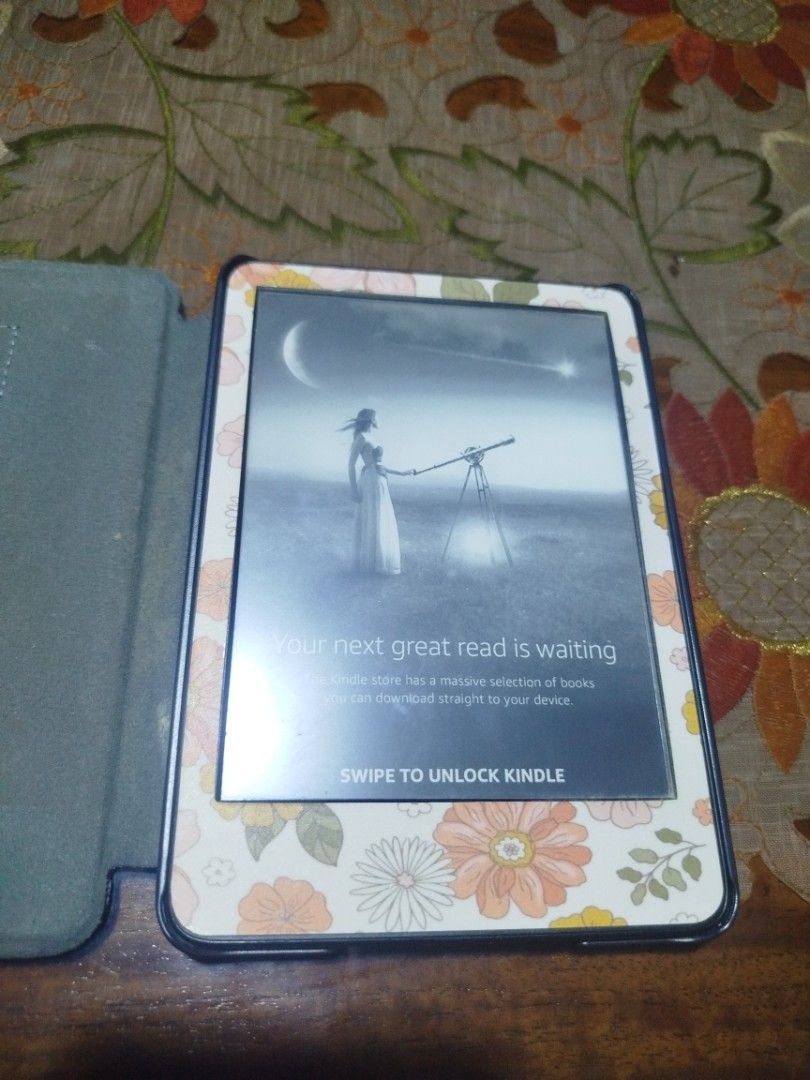 Pre-loved Kindle Basic 2022 11th Gen (Category: E-Readers) located in Bulacan. Submitted by angelinyourhead (Listing ID 1469939345, Image 1). Description: Bought this Oct. 2024. Inclusions: Unit w the floral border, almost-worn protective case, charging cable. Has ads. With minimal scratches on the back but they're not visible with the case. No other issues. Has 800+ epubs downloaded & ready to read. Epubs include titles ive read and highlighted.