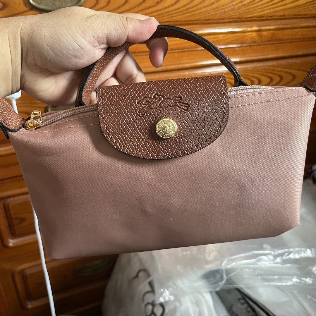 Preloved Like New LC Crossbody Bag Small (Category: Cross-body Bags) located in Binangonan. Submitted by messymeshyshop (Listing ID 1469901948, Image 2). Description: Preloved Like New LC Crossbody Bag Colors: Olive, Teal, Pink Loc: Binangonan, Rizal Mop: GCash Shipping: FREE shipping via SPX.