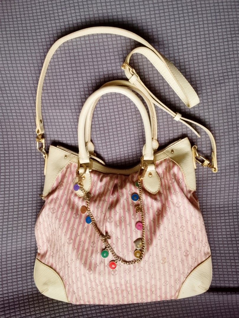 Preloved Louis Vuitton Cloth 2 WAY Bag M (Category: Shoulder Bags) located in Alicia. Submitted by celynahambotruecelyna39 (Listing ID 1469806517, Image 1). Description: in good condition.