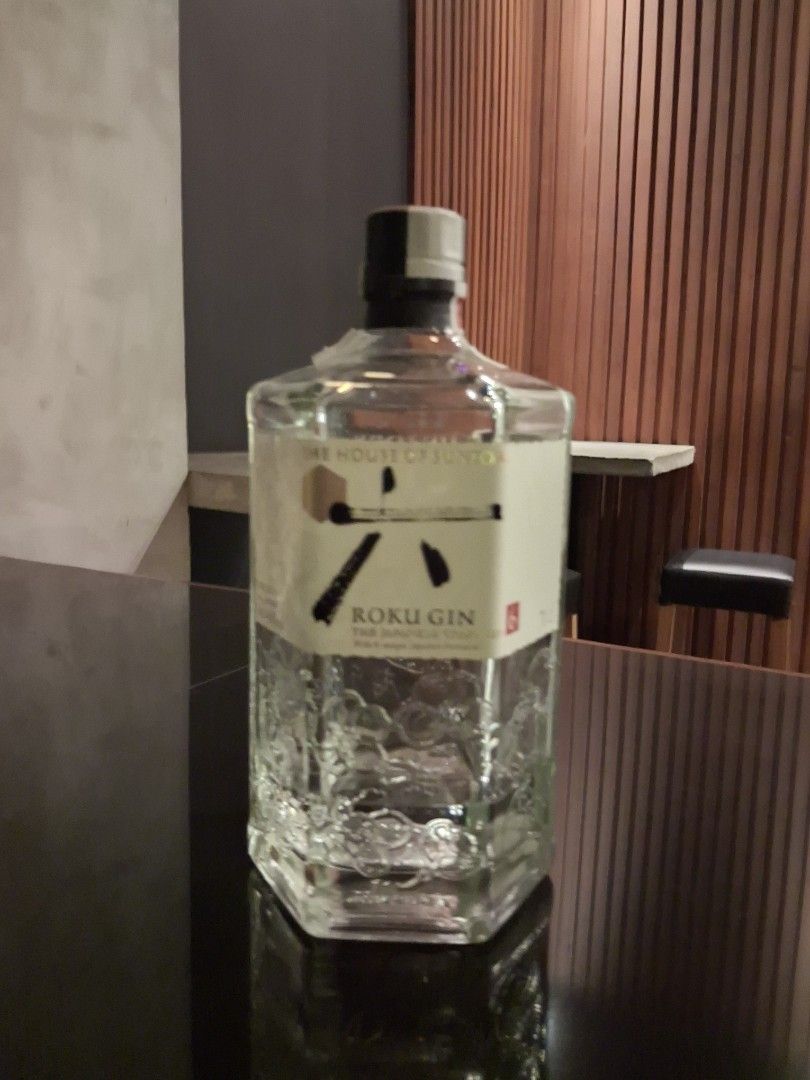 Premium empty bottle (Category: Beverages) located in Quezon City. Submitted by brightturtle.0a6d29 (Listing ID 1469922137, Image 2). Description: - Brand: Hendrick's Gin - Volume: 700ml - Alcohol Content: 41.4% ABV - Packaging: Signature dark apothecary bottle with white paper diamond label - Condition: Brand new, sealed black cap intact - Ideal for: Home bar collections, gifting, or cocktails.