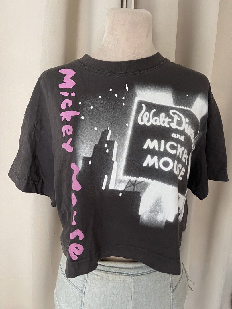 premium Mickey Crop tee (Category: Shirts) located in Cainta. Submitted by zlove111 (Listing ID 1469771744, Image 2). Description: - Charcoal grey cropped Mickey Mouse graphic print - White cityscape design with pink Mickey Mouse lettering along the side - Short sleeves and classic crew neck - Relaxed, trendy boxy fit med-large no issue .