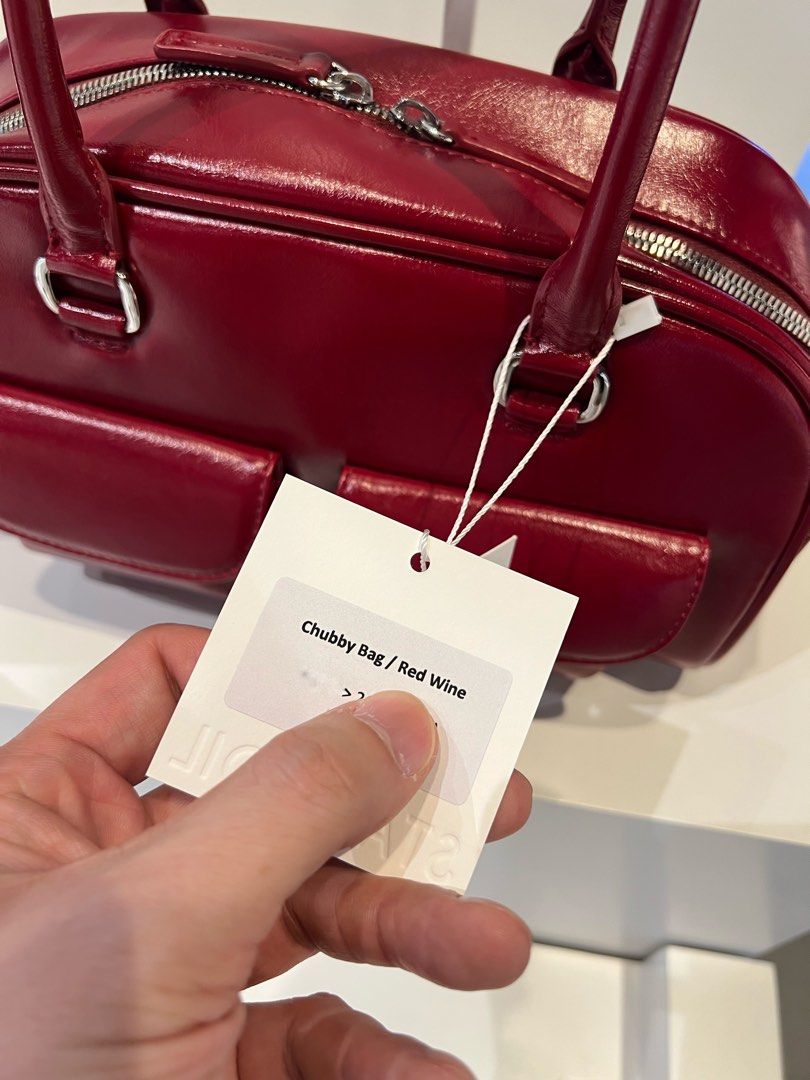 PREORDER Authentic Stand Oil Chubby Bag Red Wine (Category: Shoulder Bags) located in Manila. Submitted by essential.shop.ph (Listing ID 1469889141, Image 2). Description: PREORDER 10-12 days ETA ☺️ ‘CHUBBY BAG’ – A Round, Chubby Body, Retro Bowling Style Bag - Crinkle faux patent with wrinkles and gloss - Vintage mood handle decoration, soft double-sided zip - Pocket Details: 2 front mini flap pockets, 1 back welt pocket, 2 interior open pockets