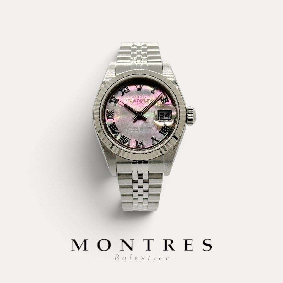 Pre-owned Rolex 26MM Datejust Jubilee 79174 Black MOP Roman Dial (Y)(2004) (Category: Watches) located in Singapore. Submitted by montresbalestier (Listing ID 1469802392, Image 1). Description: Please follow us for updates on our latest watches! Brand: Rolex Model: Datejust Reference: 79174 Size: 26MM Material: Stainless Steel & White Gold Fluted Bezel Dial: Black MOP Roman Condition: like new , watch only Warranty: Dated Y Series , Circa 2004 (c
