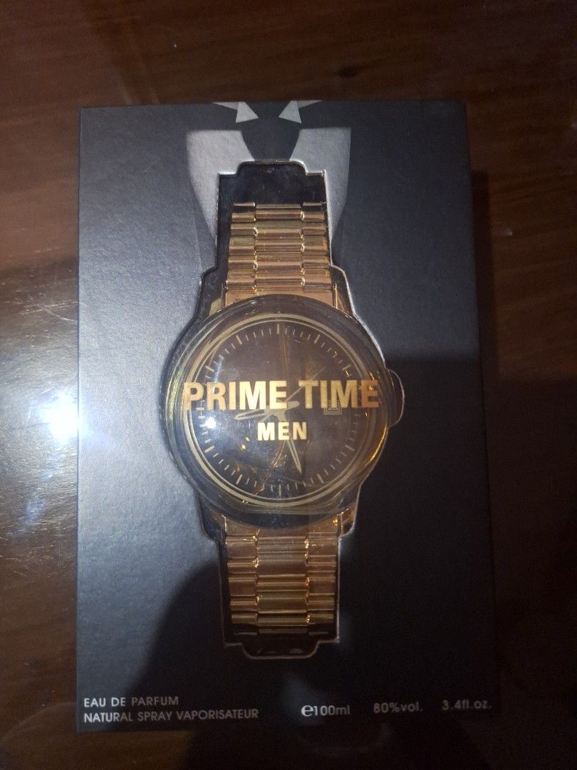 Prime Time Men Eau De Parfum 100ml (Category: Fragrance & Deodorants) located in Las Pinas. Submitted by buzilife2026 (Listing ID 1469759084, Image 1). Description: - Product: Prime Time Men Eau de Parfum - Volume: 100ml / 3.4 fl oz (Natural Spray Vaporisateur, 80% vol) - Condition: Brand new, unopened, and still sealed in original plastic wrap - Packaging: Sleek black box featuring an elegant gold watch graphic design - 100% authentic and ready 