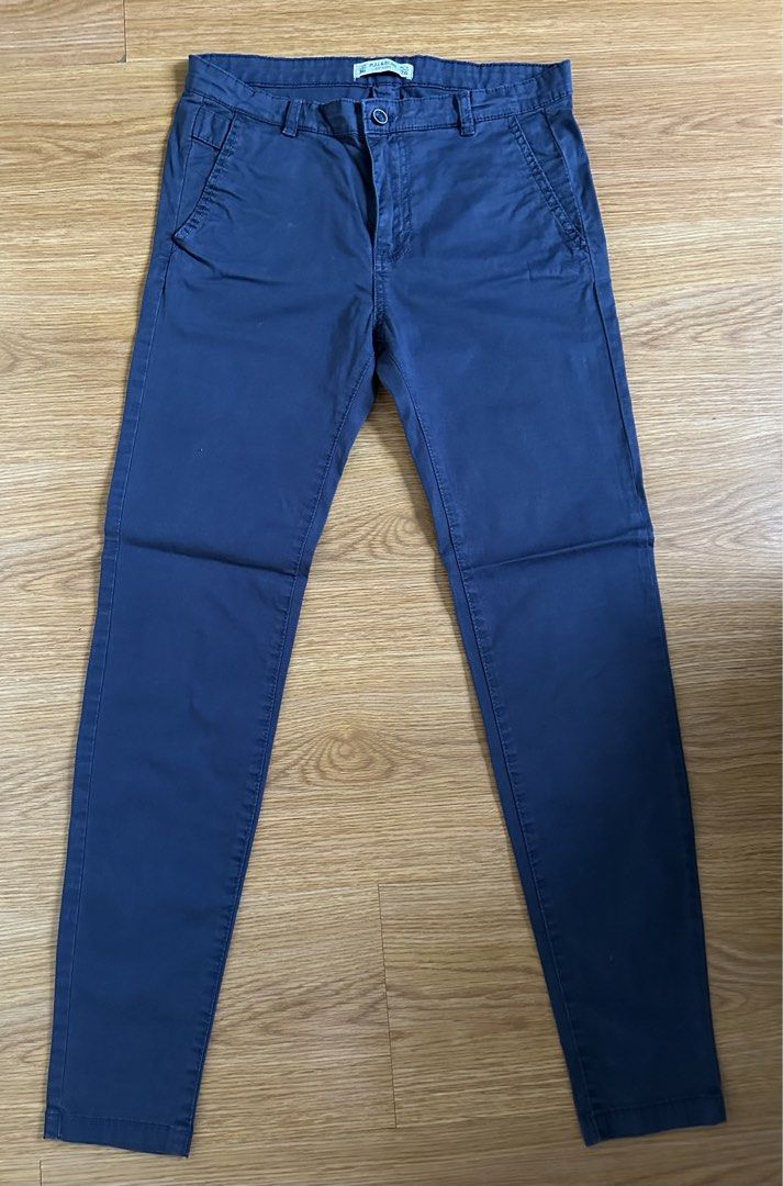Pull & Bear Blue Chinos Size SmallEUR 36 (Category: Jeans) located in Mandaluyong City. Submitted by unworntobarelyworn (Listing ID 1469859817, Image 1). Description: - Condition: 10/10 - Brand: Pull & Bear - Style: Slim fit chino pants - Color: Dark Blue - Size: EUR 36 / MEX 26 - Closure: Button and zip fly - Condition: Clean fabric with good quality stitching throughout.
