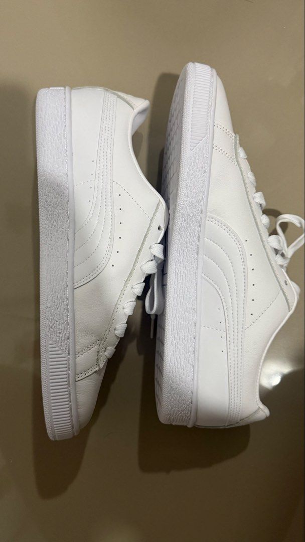 Puma Basket White Leather Sneakers (Category: Sneakers) located in Rizal. Submitted by 20.kph (Listing ID 1469892528, Image 3). Description: - Brand/Model: Puma Basket - Color: White with gold branding - Design: Classic low-top with green and white tongue tag - Features: Patterned insoles, white laces - Inclusion: Original green Puma shoebox - Condition: Clean, crisp, and ready to wear Negotiable for sure buyer!.