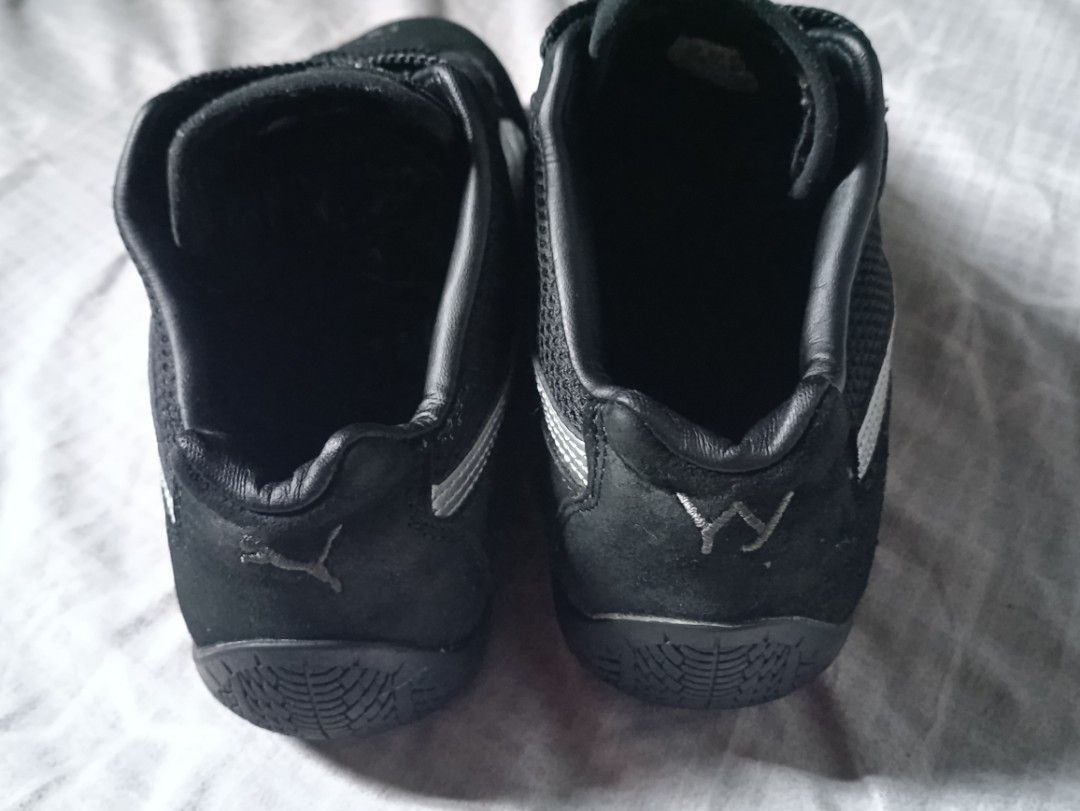 Puma Black and Silver Speedcat Sneakers (Category: Casual Shoes) located in Manila. Submitted by keenforest.c4b4c0 (Listing ID 1469866713, Image 2). Description: - Brand/Model: Black Puma low-profile driving shoes - Design: Sleek sporty style with iconic silver side stripes - Comfort: Breathable mesh panels and classic black laces - Durability: Sturdy rubber soles for daily wear - Details: Signature Puma logo on the toe and tongue area - Conditio