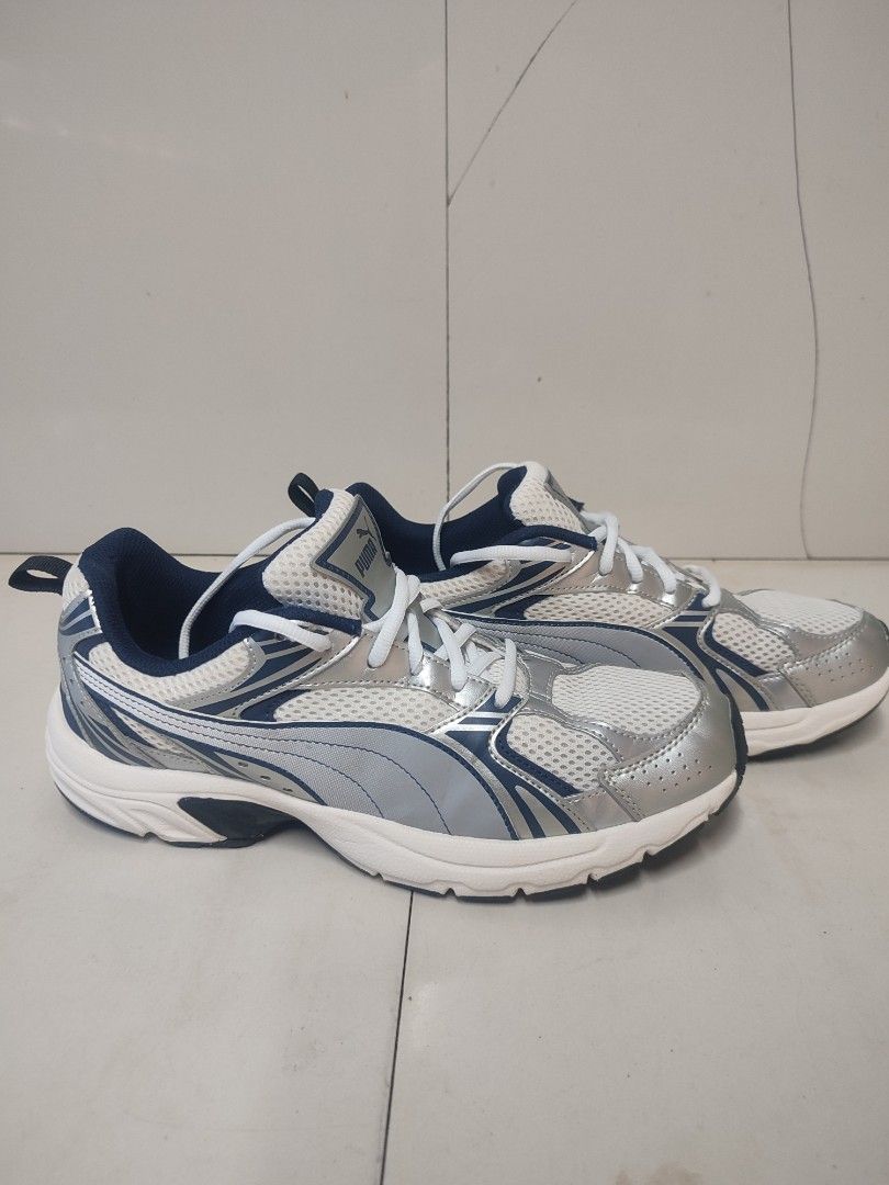 Puma Milenio / Milenio Tech white, silver, Gray (Category: Dress Shoes) located in Leyte. Submitted by jeromealar77079 (Listing ID 1469769439, Image 2). Description: brand new condition issue no box only authentic.