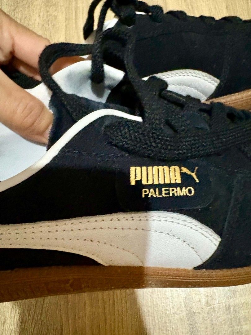 Puma Palermo Black Gumsole (Category: Sneakers & Footwear) located in Mandaluyong City. Submitted by reverendsdaughter (Listing ID 1469936997, Image 2). Description: Used like 3 lang ata kasi I have a bunch of pairs and di nasusuot since I’m WFH and I don’t go out a lot. Complete size details indicated in the box. US Men’s 6 fits perfectly sa Women’s 8 or 7.5. RFS: moving out.