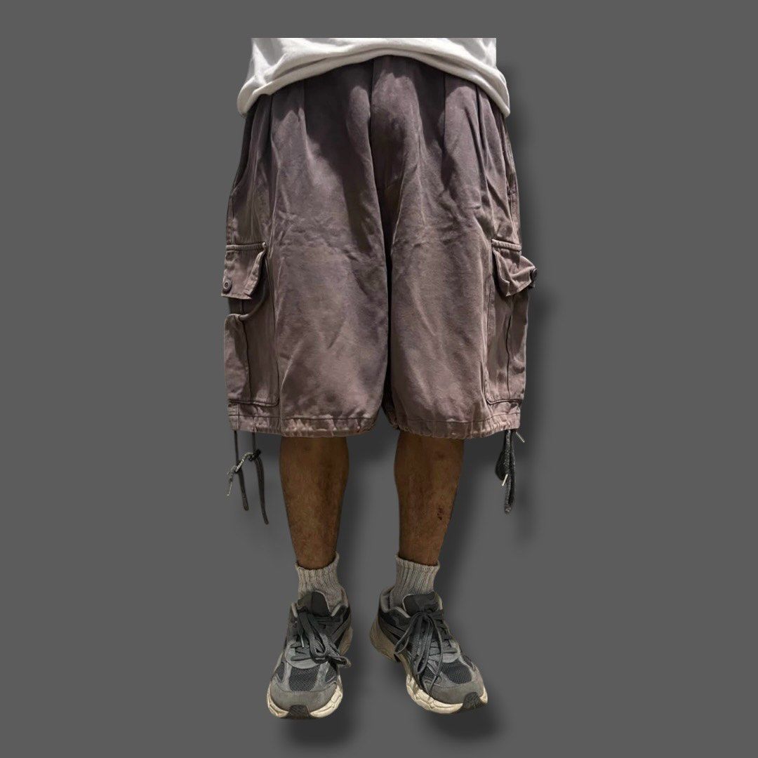 Purple Baggy Cargo Jorts (Category: Shorts) located in Caloocan City. Submitted by solothuggin___ (Listing ID 1469933358, Image 2). Description: Purple Baggy Cargo Jorts • good condition, beautiful fade • high quality cotton fabric • color rate: 7/10 Waist: OPEN - 37" (adjustable with drawstring) Length: 21" Thigh: 16.5" Hem opening: 15" (adjustable with drawstring) C/Claim: ₱450 No bidding on this one, for claim only. First to pay basis..