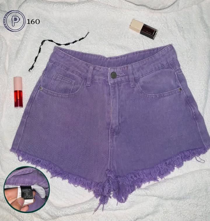 Purple Denim Shorts (Category: Shorts) located in Cebu City. Submitted by venomouswhisk (Listing ID 1469817306, Image 1). Description: - Brand: SHEIN - Item: Purple Denim Shorts - Size: S (tag attached) - Details: Raw frayed hem, button closure, zipper fly - Color: Vibrant purple - Condition: Great for casual daily outfits MOP: Gcash mod: j&t.
