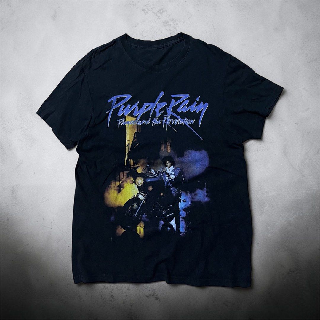 Purple rain ☔️ (Category: Formal Shirts) located in San Jose. Submitted by thriftfindsarchive (Listing ID 1469915615, Image 1). Description: Men’s Women’s Purple rain band tee -W’ 18 -L’ 26 - Issue: minimal pinhole -As new condition -fade tag - Fave ✨.