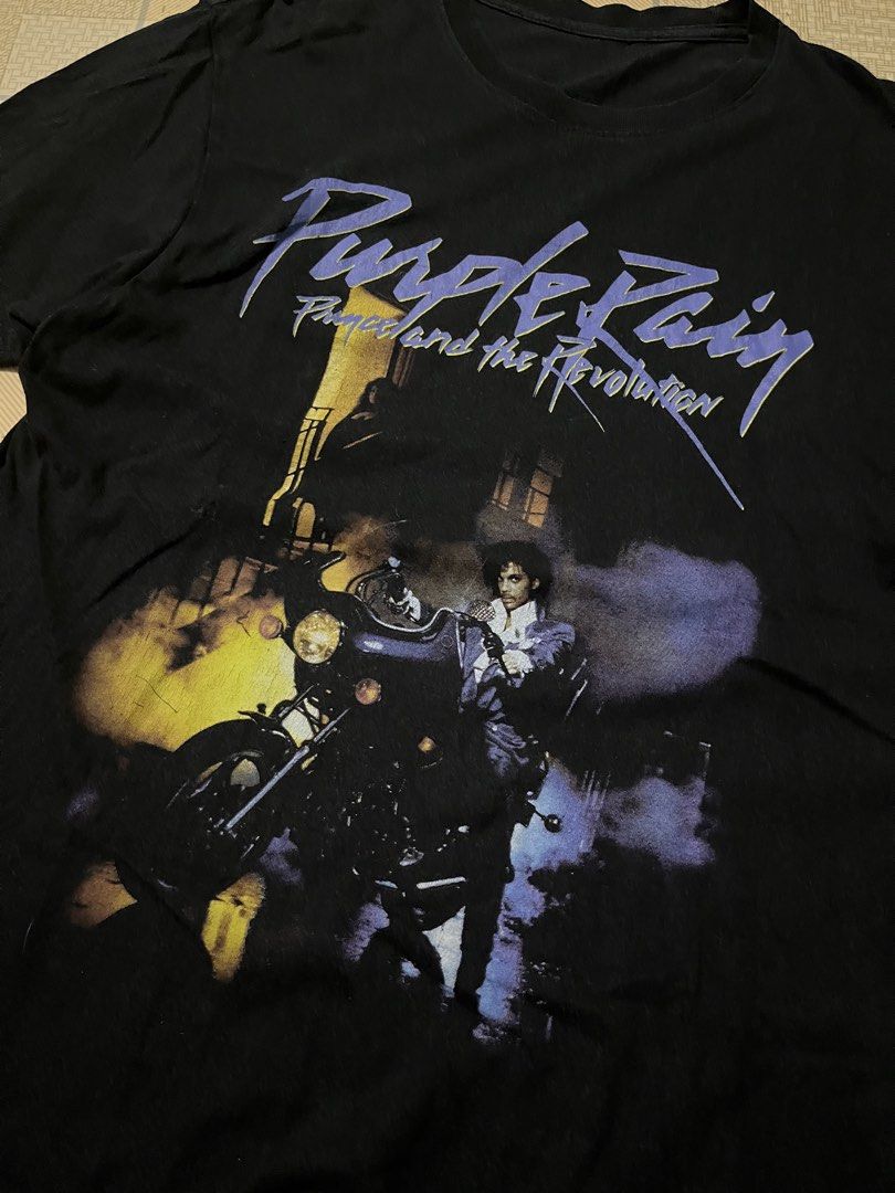 Purple rain ☔️ (Category: Formal Shirts) located in San Jose. Submitted by thriftfindsarchive (Listing ID 1469915615, Image 2). Description: Men’s Women’s Purple rain band tee -W’ 18 -L’ 26 - Issue: minimal pinhole -As new condition -fade tag - Fave ✨.