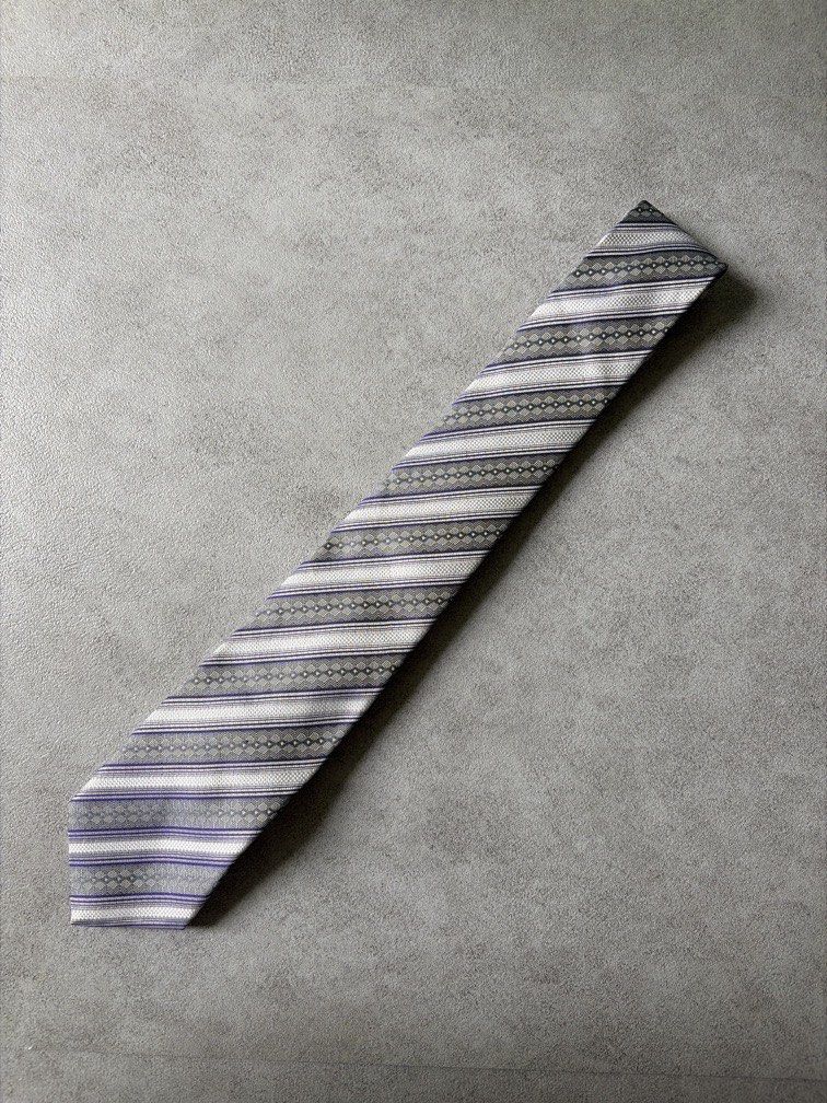 Purple Striped Necktie (Category: Ties) located in Pasig City. Submitted by chamoisee (Listing ID 1469787546, Image 1). Description: Purple Striped Necktie .