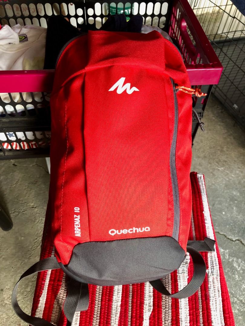Quechua Arpenaz 10 Backpack Red Grey (Category: Backpacks) located in Calamba. Submitted by marjoh29436 (Listing ID 1469850105, Image 3). Description: - Brand: Quechua Arpenaz 10 - Color: Red and grey - Capacity: Compact 10 litres - Features: Closure Zippered front pocket and comfortable padded shoulder straps - Condition: UNUSED, no Tag, 100% clean interior/exterior and in good condition. (SEE PHOTOS) Bought in Decathlon, Germany SIZE: 12" Depth
