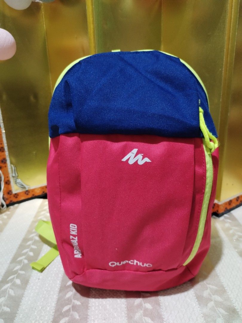 Quechua Arpenaz Kid Backpack Blue Pink Green (Category: Backpacks) located in La Trinidad. Submitted by malditas (Listing ID 1469919811, Image 1). Description: - Brand: Quechua Arpenaz - Color: Vibrant blue, pink, and bright green (easy to spot outdoors!) - Access: Wrap-around side zipper for wide and easy opening - Comfort: Adjustable shoulder straps with a secure chest buckle - Storage: Clean interior with a main compartment and inner pocket - 