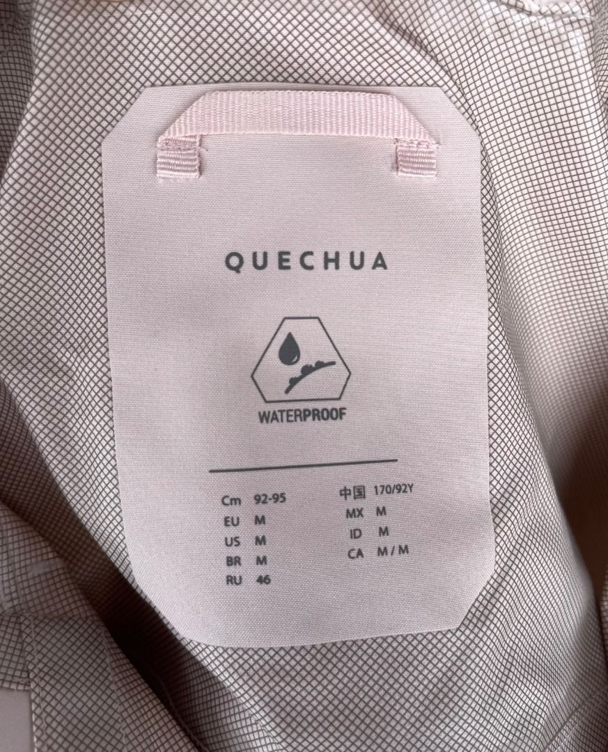 Quechua hiking rain jacket waterproof (Category: Hiking & Camping) located in Makati City. Submitted by maaarrrjjjj (Listing ID 1469767237, Image 2). Description: - Size: Medium - Color: light pink - Full front zip with storm flap - 2 zipped hand pockets - Adjustable drawstrings hood - Lightweight.