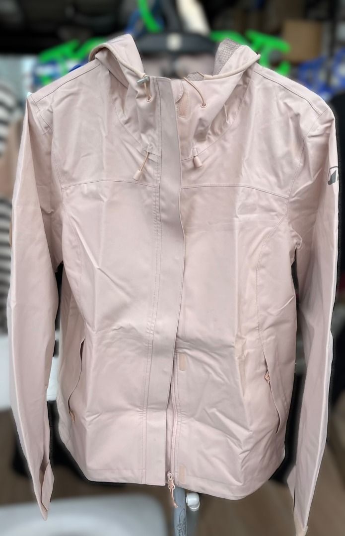 Quechua hiking rain jacket waterproof (Category: Hiking & Camping) located in Makati City. Submitted by maaarrrjjjj (Listing ID 1469767237, Image 1). Description: - Size: Medium - Color: light pink - Full front zip with storm flap - 2 zipped hand pockets - Adjustable drawstrings hood - Lightweight.