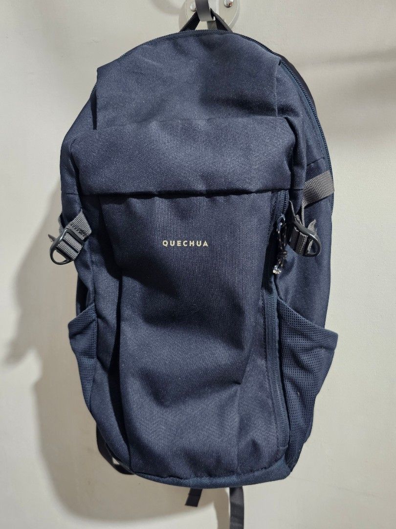 Quechua Navy Blue Backpack (Category: Backpacks) located in Cainta. Submitted by ej_emuslan (Listing ID 1469784868, Image 2). Description: - Authentic Quechua compact daypack in dark blue - Ideal for daily commutes, school, or weekend hikes - Padded shoulder straps with adjustable loops for comfort - Main zippered compartment and convenient smaller front pocket - Handy mesh side panels for water bottles or small items - Clean inside and out with 