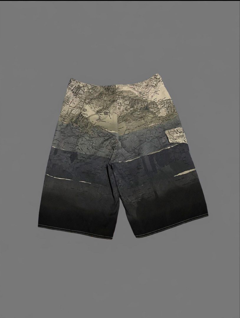 Quiksilver Map Print Board Shorts Size 30 (Category: Swim Trunks & Board Shorts) located in Manila. Submitted by chawmichael (Listing ID 1469774403, Image 2). Description: - Brand: Quiksilver - Size: 30 - Design: Stylish topographic map print with a white-to-black fade - Features: Secure drawstring waist, iconic Quiksilver mountain wave logo, and a single back pocket with flap closure - Condition: Ready for the beach, pool, or surf sessions.