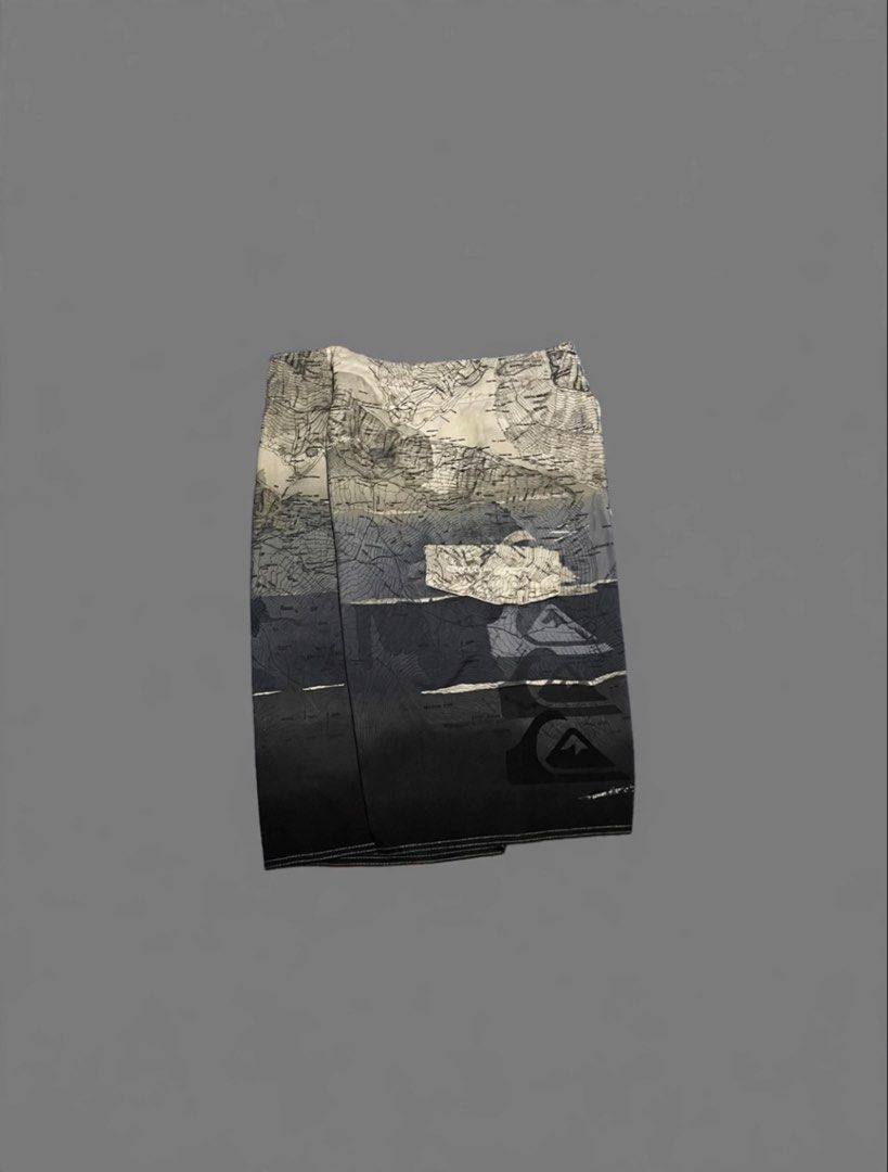 Quiksilver Map Print Board Shorts Size 30 (Category: Swim Trunks & Board Shorts) located in Manila. Submitted by chawmichael (Listing ID 1469774403, Image 3). Description: - Brand: Quiksilver - Size: 30 - Design: Stylish topographic map print with a white-to-black fade - Features: Secure drawstring waist, iconic Quiksilver mountain wave logo, and a single back pocket with flap closure - Condition: Ready for the beach, pool, or surf sessions.