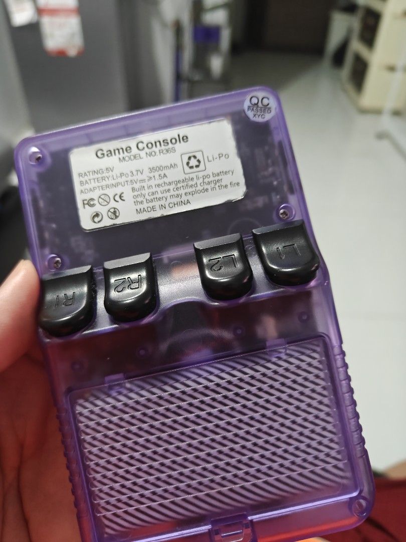 R36S Open Source Purple Handheld Game Console (Category: Nintendo) located in Tarlac. Submitted by raphocehcap (Listing ID 1469867472, Image 3). Description: Good as new slightl used. 25,000 Games (128gb card/ 2nd slot) Display: 3.5- inch IPS full viewing angle,640*480 Processor: ARM64 bit quad core A35 Cortex 1.5Ghz Default Memory storage:64GB/128G TF/MicroSD TF card: Dual card slot, support TF card expansion Colors: Transparent Purple/Transpare