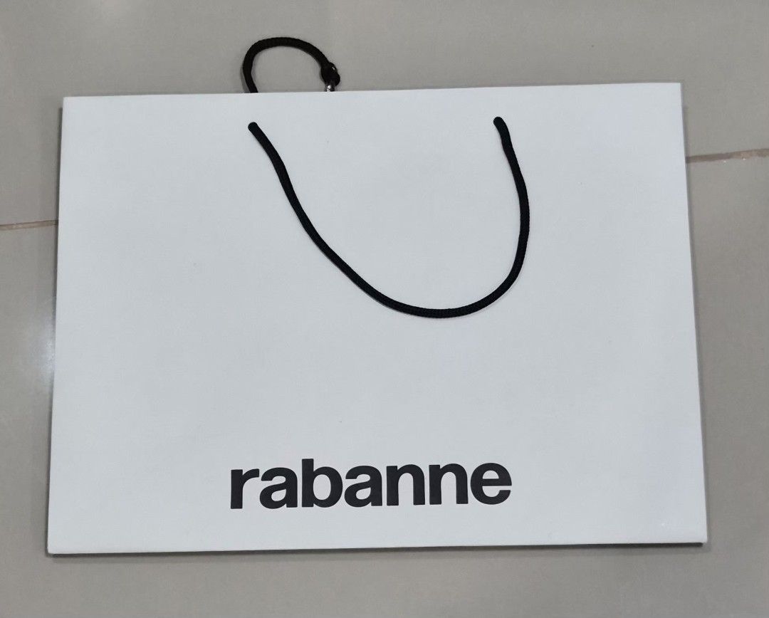 Rabanne Paper Bag (Category: Everything Else Others) located in Paranaque City. Submitted by lovelife.312 (Listing ID 1469836695, Image 1). Description: ***PLEASE READ CAREFULLY*** - 1 piece - decluttering room MAILING AND DELIVERY: - Meet up only SM City Sucat, Uptown Mall BGC and Ayala Malls by the Bay. - After lunch time 1pm onward. - If you prefer delivery, buyer will book courier and shoulder shipping fee. MOP: I will also require upfront pa