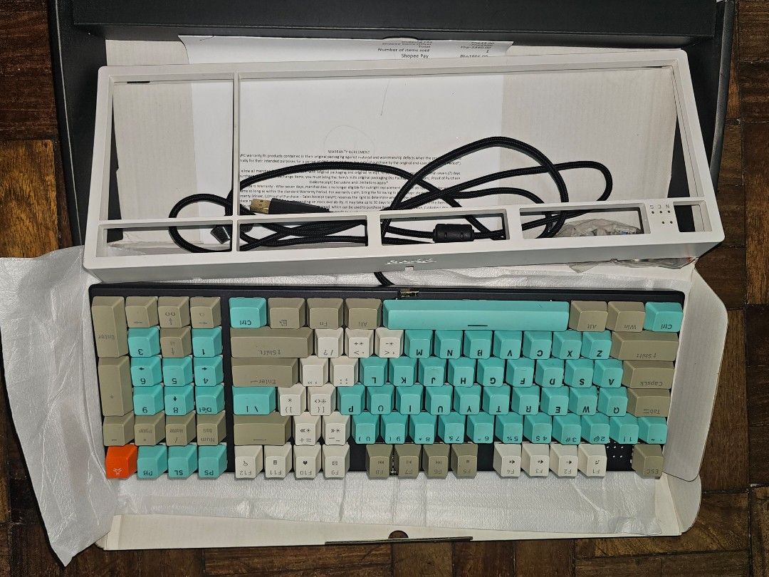 Rakk Ilis Premium Mechanical Keyboard (Category: Computer Keyboard) located in Quezon City. Submitted by bokkimmy (Listing ID 1469875293, Image 3). Description: - Brand: Rakk Ilis Mechanical Keyboard - Switches: Outemu Blue (clicky and tactile) - Keycaps: PBT double-shot (includes extra mint green and grey keycaps) - Lighting: RGB Backlit - Features: Full anti-ghosting NKRO, great for gaming and typing - Inclusions: Original box, manuals, and USB