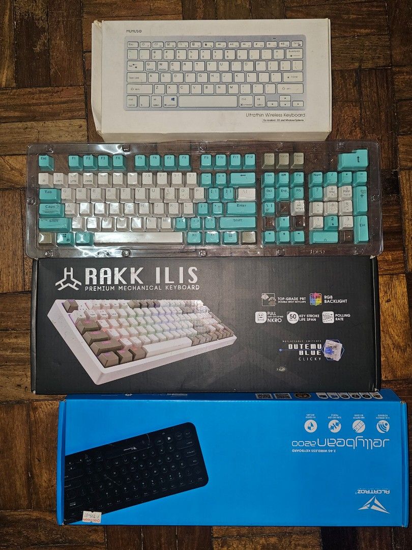 Rakk Ilis Premium Mechanical Keyboard (Category: Computer Keyboard) located in Quezon City. Submitted by bokkimmy (Listing ID 1469875293, Image 1). Description: - Brand: Rakk Ilis Mechanical Keyboard - Switches: Outemu Blue (clicky and tactile) - Keycaps: PBT double-shot (includes extra mint green and grey keycaps) - Lighting: RGB Backlit - Features: Full anti-ghosting NKRO, great for gaming and typing - Inclusions: Original box, manuals, and USB