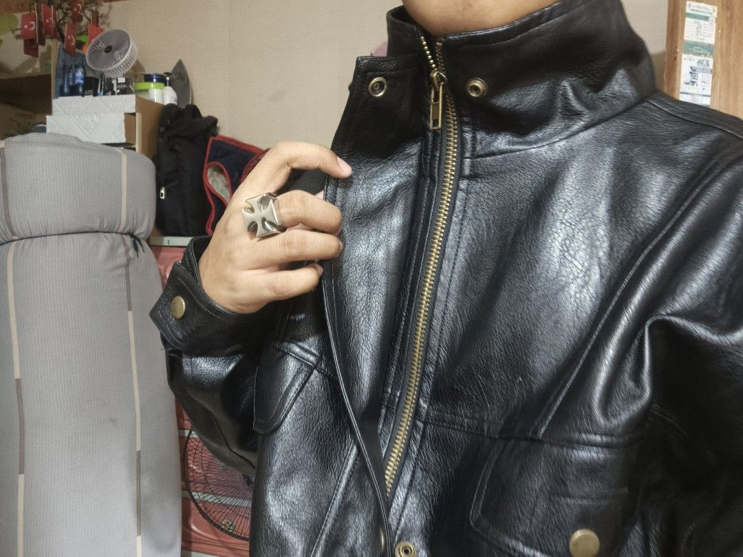 Cool Leather Jacket 😎 (Category: Coats, Jackets and Outerwear) located in Batangas. Submitted by arbi_sel (Listing ID 1467515342, Image 3). Description: - Item: Random black leather jacket - Size: Fits Medium to Large frames - Condition: Good, with a very minor flaw near the collar area - Style: Edgy and cool vibe, perfect for tomboy or casual outfits - Inquiries: Send a private message for more pictures and details.