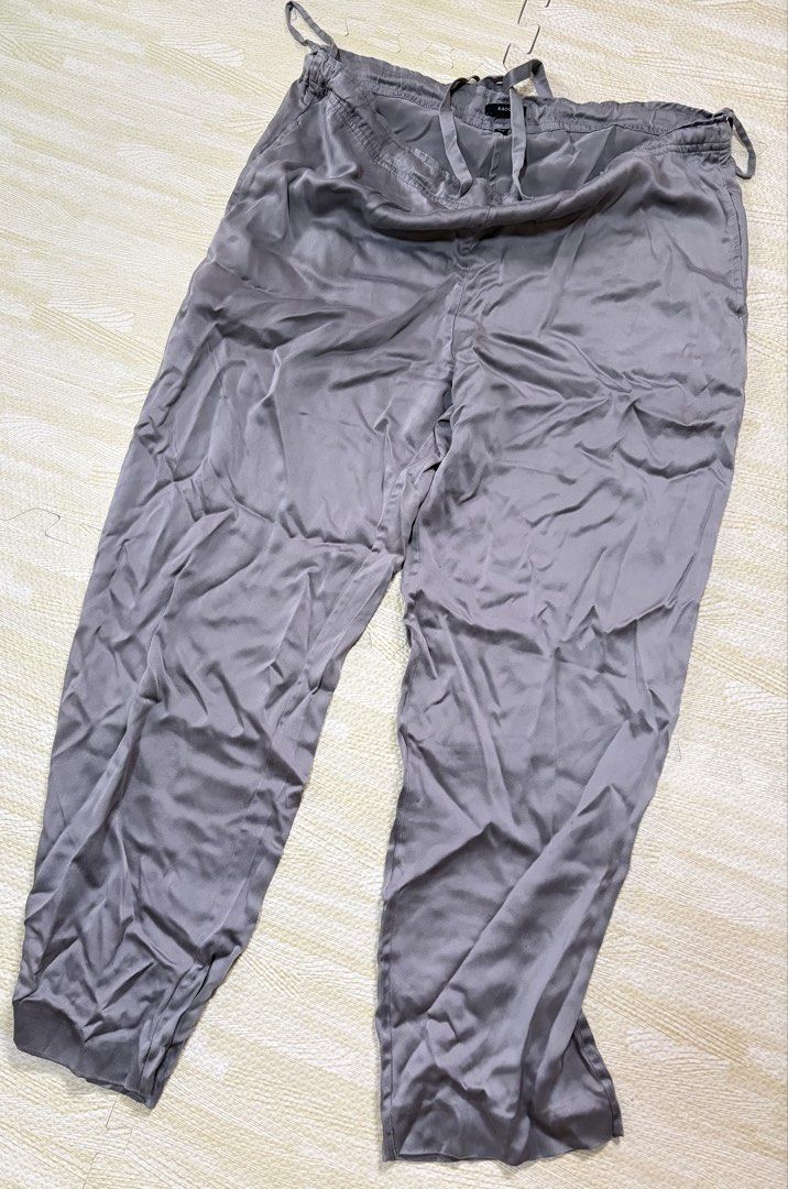 Raoul Grey Silk Drawstring Pants FR 36 US 4 (Category: Trousers) located in Quezon City. Submitted by marifavo (Listing ID 1469822777, Image 1). Description: - Brand/Item: Raoul grey silk pants - Size: FR 36 / US 4 (Small) - Fit: Relaxed fit through the legs with an adjustable elastic waistband and drawstring tie - Material: Lightweight silk fabric with a subtle, elegant sheen - Condition: Good, but has storage wrinkles and needs steaming before 
