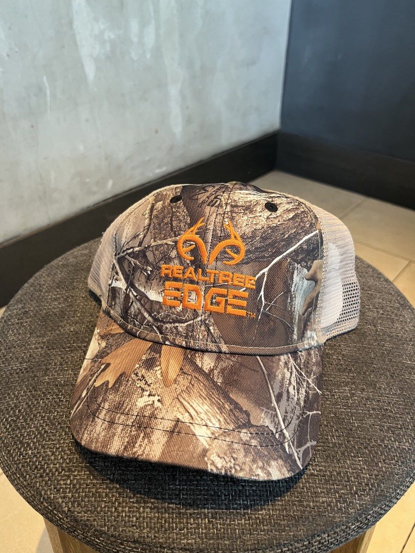 REALTREE TRUCKER HAT (Category: Caps & Hats) located in Quezon City. Submitted by headline. (Listing ID 1469826892, Image 1). Description: REALTREE TRUCKER HAT EDGE SNAPBACK EXCELLENT CONDITION FOR ONLY:750php +SHIPPING FEE.