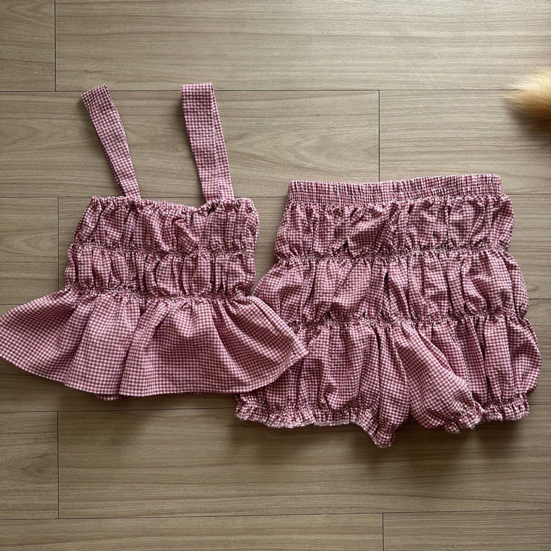Red gingham top and bloomer shorts set (Category: Sets or Coordinates) located in Pasig City. Submitted by ruthalyssa (Listing ID 1469837376, Image 2). Description: Used once. Fits small to semi large. Shop’s photos on the last 2 slides :).