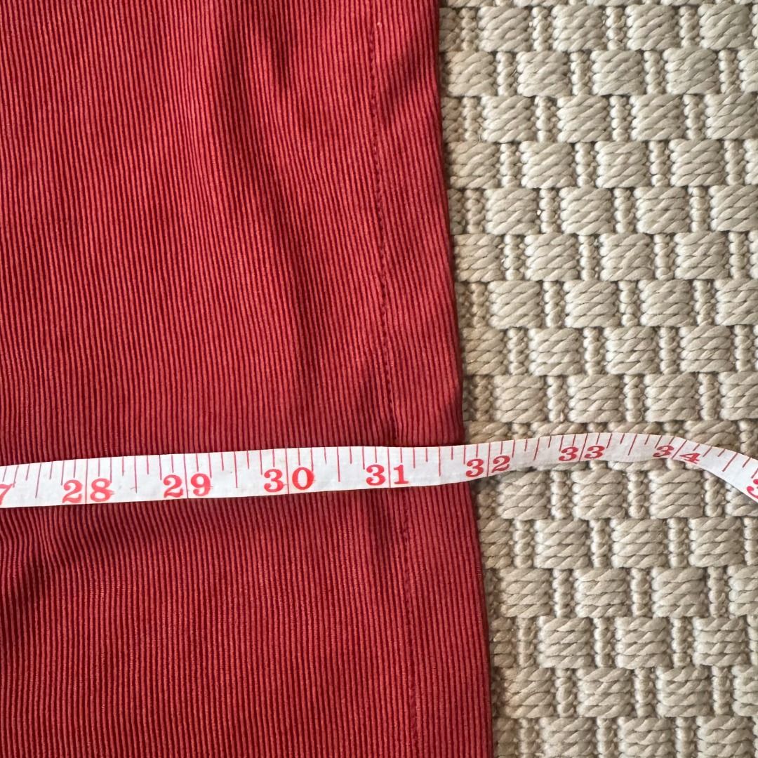 Red Pencil Skirt with Front Slit (Category: Skirts) located in Marikina City. Submitted by repurpose_studio (Listing ID 1469783382, Image 1). Description: - Style: Fitted bodycon midi skirt with front slit at the hem - Color: Rich red - Material: Structured textured fabric with stretch - Closure: Back zipper with clean-finish waistband - Occasion: Perfect for work, meetings, or going out.