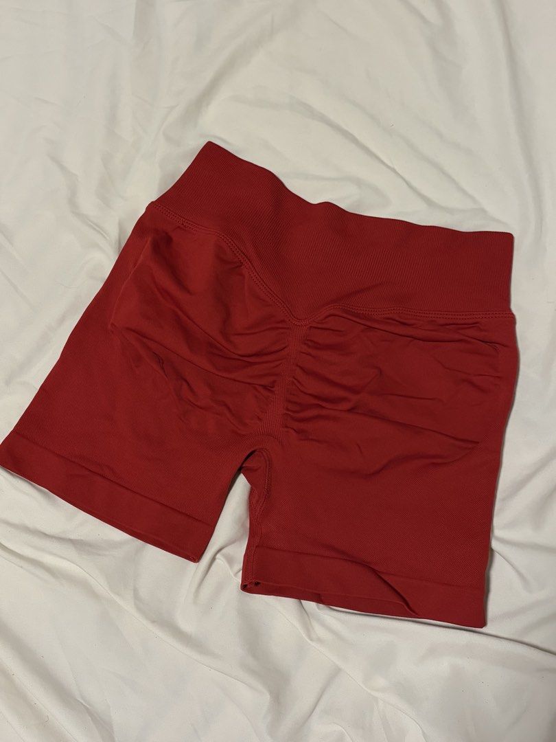 RED SCRUNCH GYM SHORTS (Category: Shorts) located in Manila. Submitted by rellasoli (Listing ID 1469867473, Image 3). Description: Red Scrunch Butt Biker Shorts ❤️ * Vibrant red, high-waisted biker shorts * Scrunch butt detail for a flattering fit * Stretchy, ribbed fabric with a wide waistband * Perfect for gym, Pilates, or casual wear * Condition: Preloved Disclaimer: * Please manage expectations as this is a preloved item. * Minor signs of wea