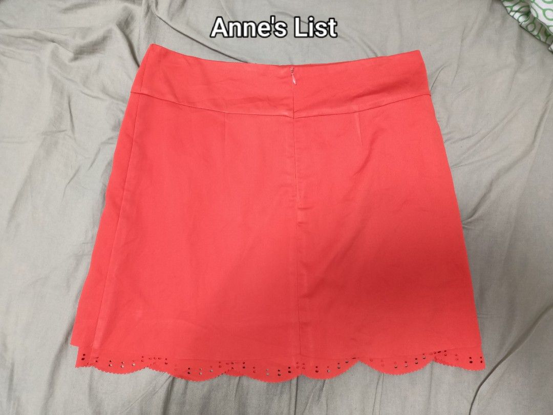 Red Skirt with Scalloped Eyelet Hem (Category: Skirts) located in Santa Maria. Submitted by anne_s.list (Listing ID 1469873595, Image 3). Description: - Color: Bright red - Size: Fits M to L frames - Details: Cute scalloped eyelet hem, clean finish with back zipper - Condition: Great shape, worn only a few times - Note: Unbranded piece, model stands at 5'2".