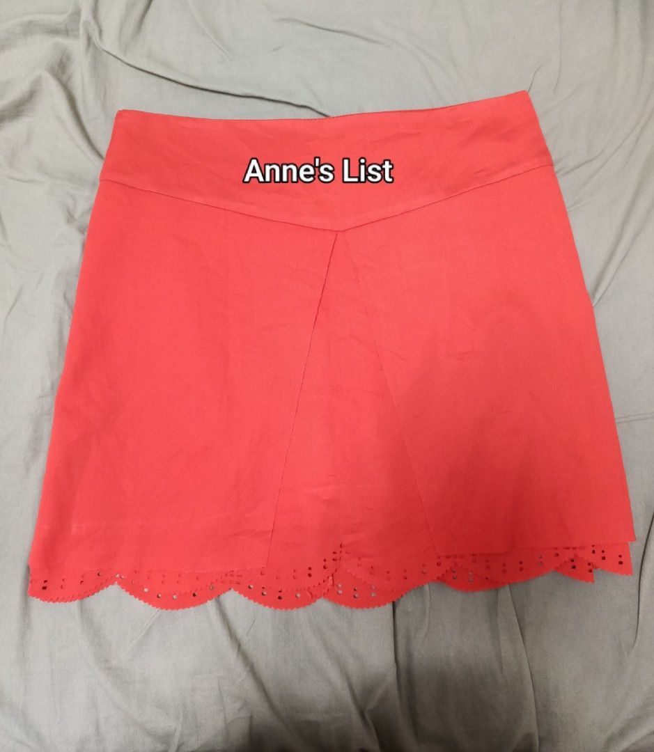 Red Skirt with Scalloped Eyelet Hem (Category: Skirts) located in Santa Maria. Submitted by anne_s.list (Listing ID 1469873595, Image 2). Description: - Color: Bright red - Size: Fits M to L frames - Details: Cute scalloped eyelet hem, clean finish with back zipper - Condition: Great shape, worn only a few times - Note: Unbranded piece, model stands at 5'2".