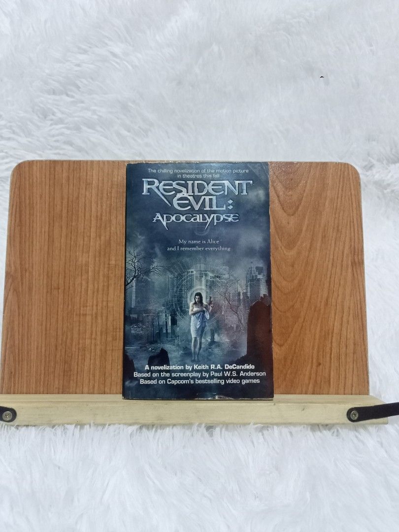 Resident Evil: Apocalypse Novelization by Keith R.A. DeCandido (Category: Comics & Manga) located in Santa Maria. Submitted by odetothereader (Listing ID 1469784929, Image 1). Description: - Title: Resident Evil: Apocalypse (Movie Novelization) - Author: Keith R.A. DeCandido (Based on Paul W.S. Anderson's screenplay and Capcom's video games) - Publisher: Simon & Schuster - Format: Standard mass market paperback - ISBN: 0-7434-9349-4 - Condition: 