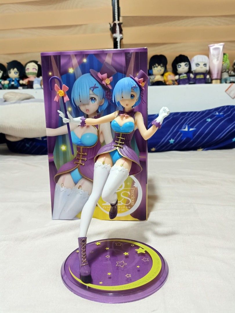 Re:Zero Rem The Magician Figure (Category: Figurines & Statues) located in Bulacan. Submitted by gilsplushiesandcollectibles (Listing ID 1469864586, Image 1). Description: - BIB no Brown Box - Character: Rem from Re:Zero - Version: Cute circus outfit (purple and blue color scheme with matching top hat, boots, and star-patterned base) - Brand/Type: Official Taito prize figure - Condition: Clean and well-maintained, perfect for display.