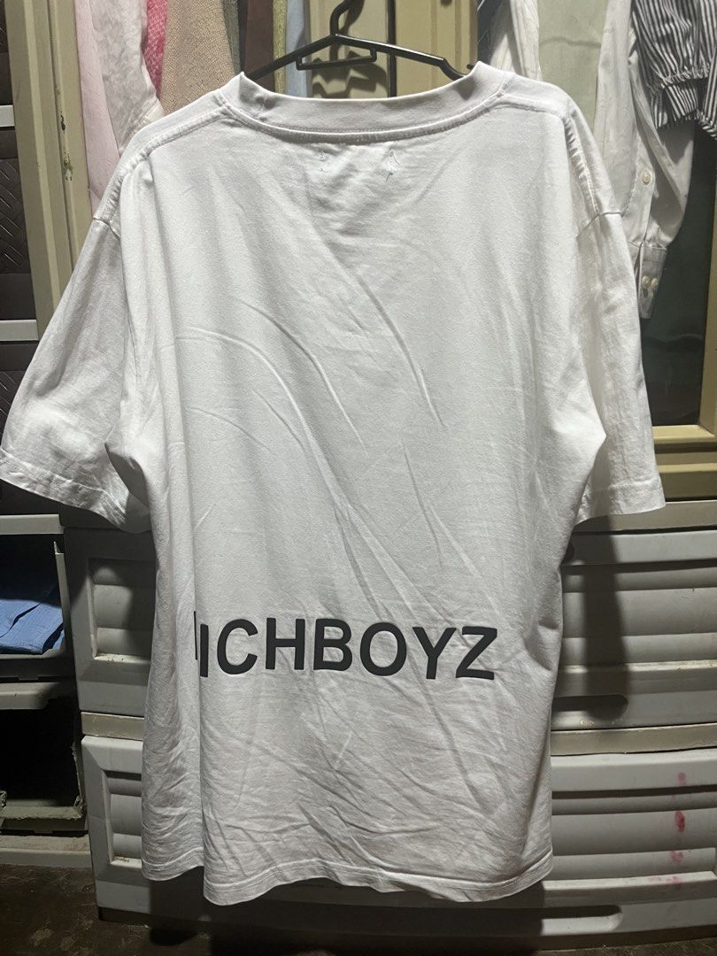 Richboyz White Graphic T-Shirt (Category: Tshirts & Polo Shirts ) located in Taguig. Submitted by kiyo_55 (Listing ID 1469934206, Image 1). Description: - Brand: Richboyz - Color: Classic White - Material: 100% Cotton - Fit: Regular fit, short sleeves, crew neckline - Design: 'Richboyz' chest print with 'have the life you want' text; large back graphic - Condition: Excellent, clean fabric with no stains, holes, or fading - Mode of Payment: GCash,