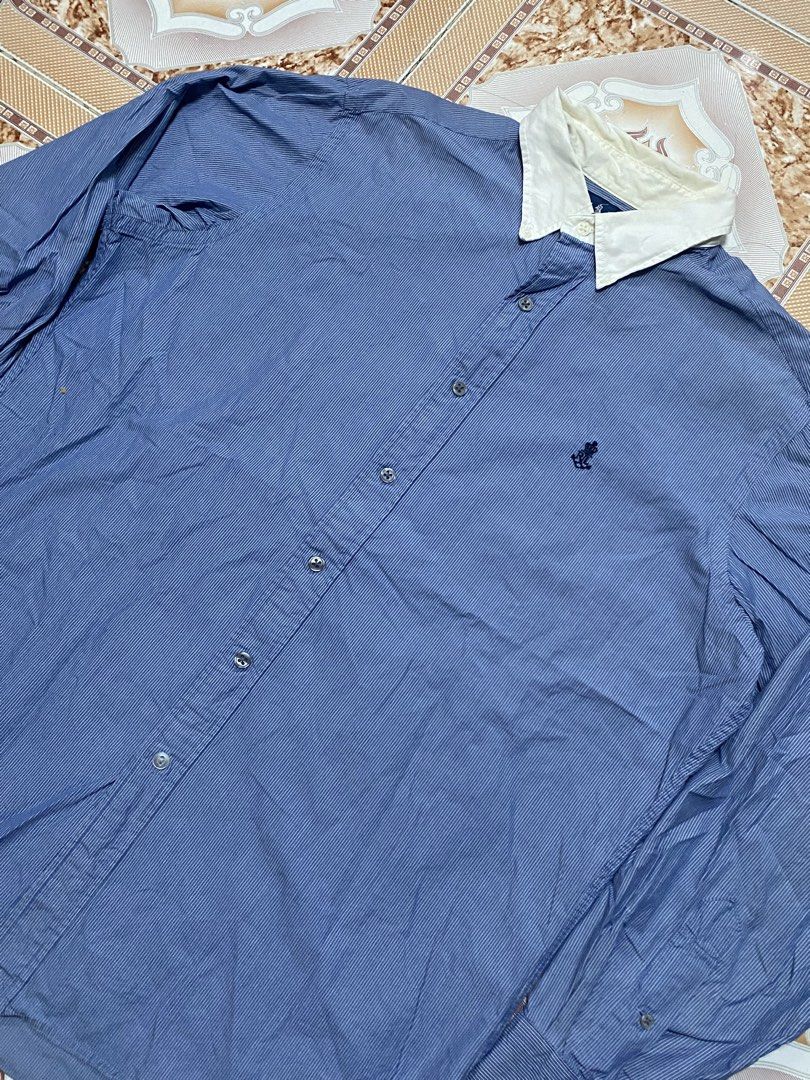 RL 00's CONTRAST COLLAR BUTTON DOWN (24w 30L 24sleeves) (Category: Tshirts & Polo Shirts ) located in Navotas City. Submitted by vincent_mosqueriola (Listing ID 1469924261, Image 2). Description: - Brand: Ralph Lauren - Style: Blue pinstripe long sleeve button-down shirt - Size: XL (Custom Fit) - Details: White contrast collar and embroidered crown RL logo on the chest - Origin: Made in Portugal - Condition: Clean shape, comfortable fabric - Vibe