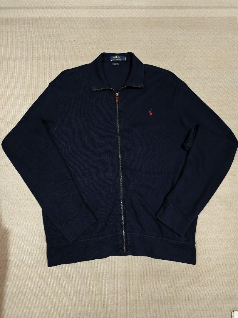 RL NAVY BLUE FULL ZIP (Category: Coats, Jackets and Outerwear) located in Baliuag. Submitted by vk_thrift01 (Listing ID 1469915815, Image 2). Description: RL NAVY BLUE FULL ZIP DIMES: 24 X 28 CONDI: EXCELLENT TO AS NEW CONDITION COLOR RATE: 9.9/10 ISSUE: NONE PRICE: 2,500 NOTE: ‼️‼️‼️ 📌ALL ITEMS ARE THRIFTED NOT BRANDNEW SO KINDLY MANAGE YOUR EXPECTATIONS. 📌ALL ITEMS ARE NEEDS WASH 📌COLOR MAY SLIGHTLY DIFFER DUE TO LIGHTING CONDITION 📌NO CANC