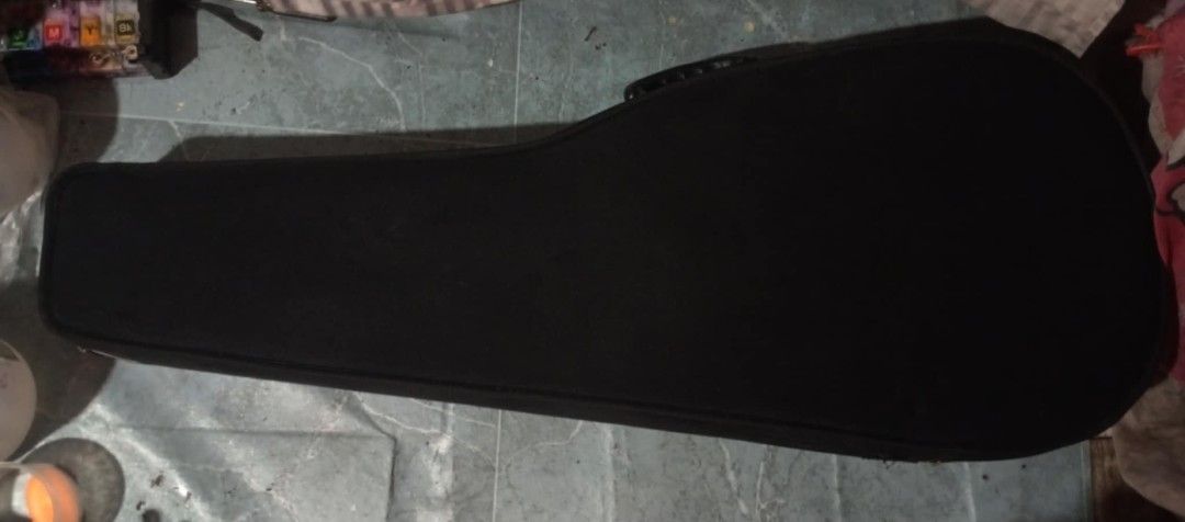 Road Runner Acoustic Featherweight Guitar Case — Original (Category: Musical Instruments) located in Caloocan City. Submitted by grandcloud.a0efa7 (Listing ID 1469872592, Image 3). Description: - Rigid hardshell exterior for ultimate bump and impact protection - Soft plush interior lining keeps your guitar scratch-free - Custom-molded shape securely fits standard guitars - Zippered outer pocket for cables, picks, and accessories - Sturdy, riveted