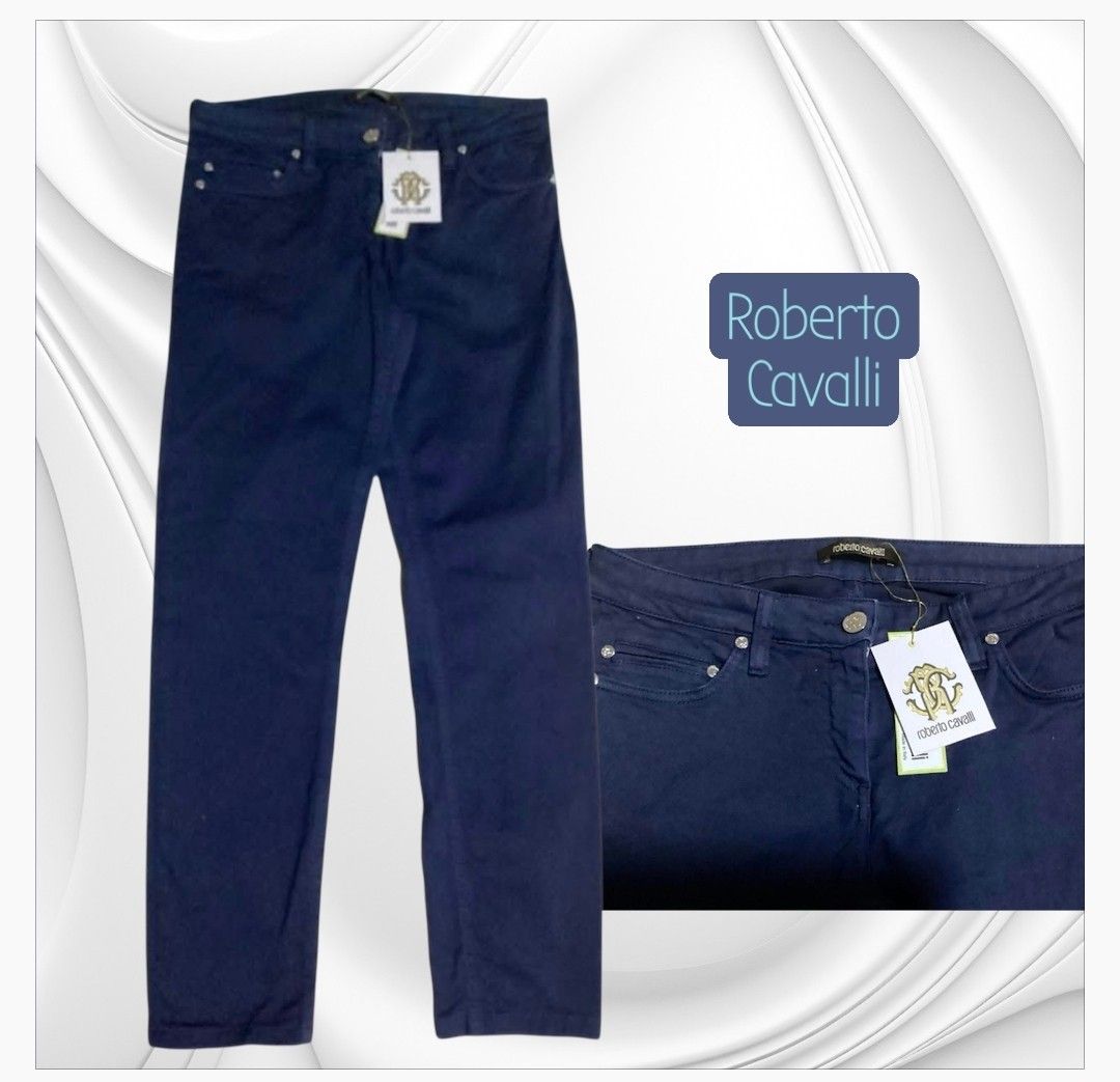 Roberto Cavalli Dark Blue Denim Jeans (Category: Jeans) located in Paranaque City. Submitted by calm_youngstore7 (Listing ID 1469880333, Image 1). Description: - Brand: Roberto Cavalli - Condition: Brand new with tags (BNWT) - Color: Dark blue - Fit: Straight leg - Style: Classic five-pocket design with embellished back pockets - Details: Branded hardware and button closure - Material: Premium Italian designer denim - Perfect for elevating your c