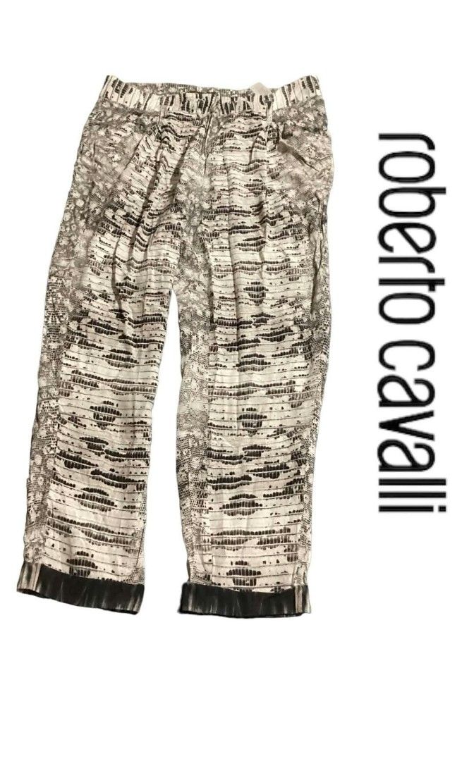 Roberto Cavalli patterned pants with dark cuffs (Category: Jeans) located in Paranaque City. Submitted by calm_youngstore7 (Listing ID 1469879897, Image 2). Description: - Authentic Roberto Cavalli designer statement pants - Eye-catching horizontal stripe and animal print pattern - Comfortable elastic waistband and relaxed fit - Features stylish dark contrasting cuffs at the bottom hems - Complete with front pleats and functional back pockets.