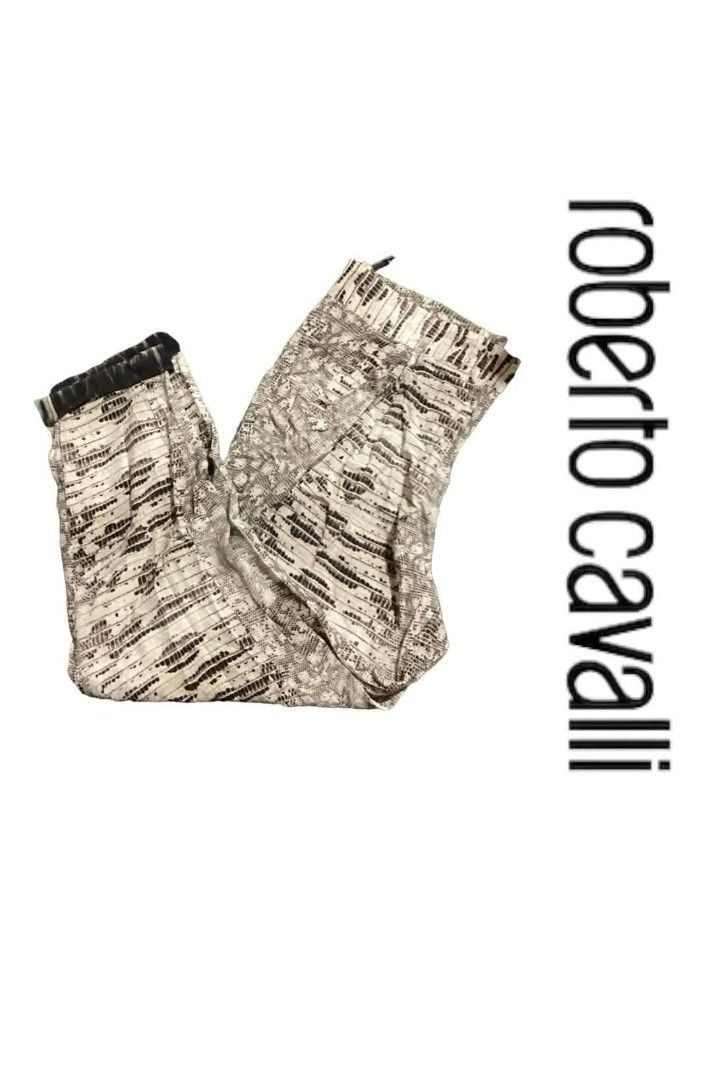 Roberto Cavalli patterned pants with dark cuffs (Category: Jeans) located in Paranaque City. Submitted by calm_youngstore7 (Listing ID 1469879897, Image 3). Description: - Authentic Roberto Cavalli designer statement pants - Eye-catching horizontal stripe and animal print pattern - Comfortable elastic waistband and relaxed fit - Features stylish dark contrasting cuffs at the bottom hems - Complete with front pleats and functional back pockets.