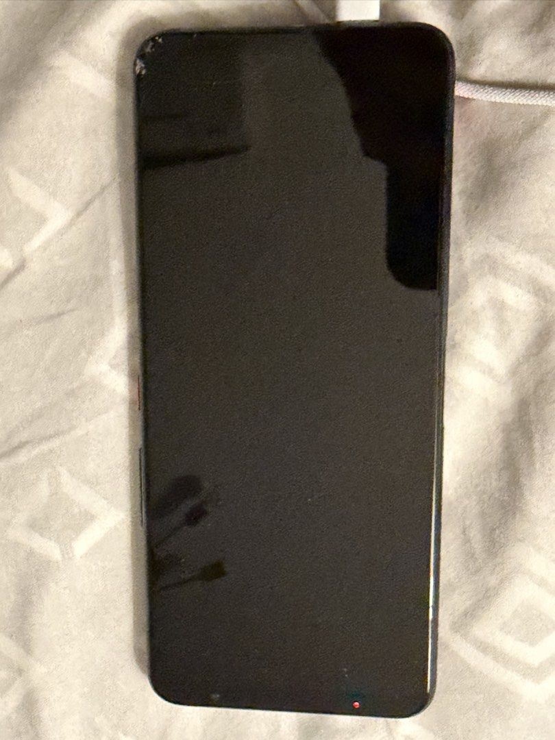 ROG 5 PHONE (Category: Asus) located in Quezon City. Submitted by eyowk (Listing ID 1469778083, Image 1). Description: UNIT ONLY!! NO BOX NO CHARGER Original Owner Only Issue: May basag sa lower right ng screen but does not affect performance Used to play and use this as a gaming phone for tournaments Nego if get asap Loc: Makati RFS: Nakatambak lang may Iphone.