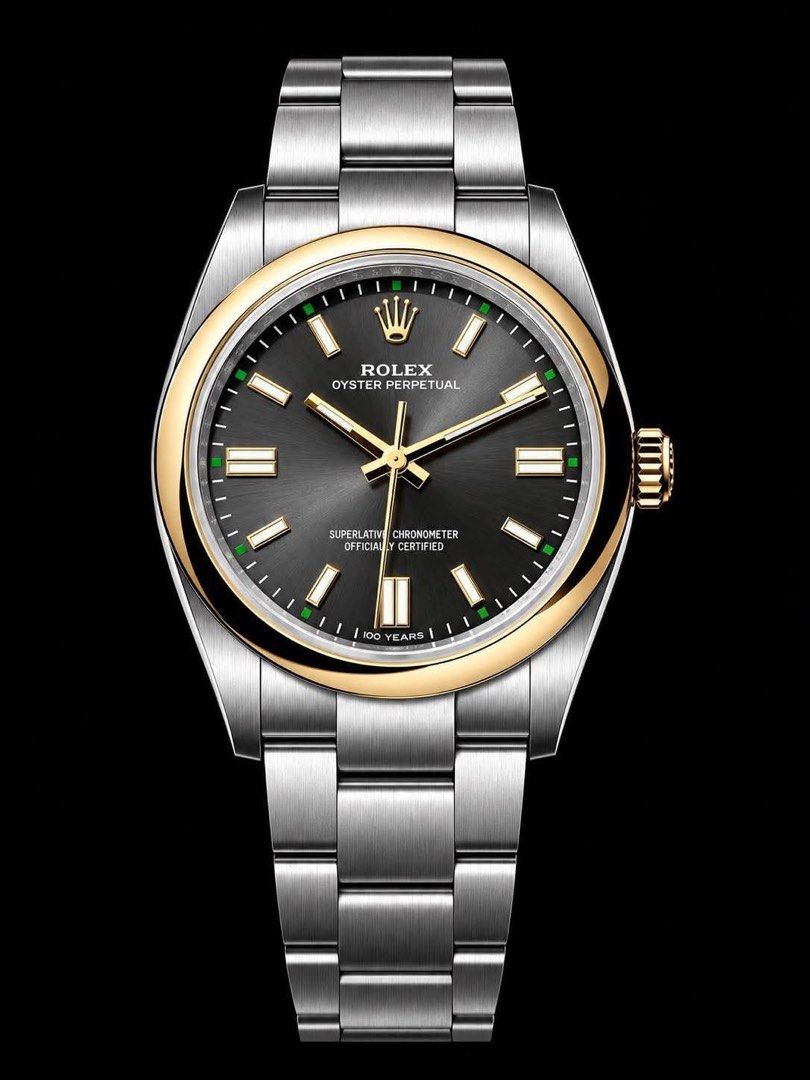 Rolex Oyster Perpetual 41 (Category: Luxury Watches) located in Taguig. Submitted by zhnprttys_on_ig (Listing ID 1469840204, Image 2). Description: ⌚ Rolex Oyster Perpetual 41 Ref. 134303 | 2026 Complete Set | ₱998,000 ✨ TIMELESS LUXURY. EXCEPTIONAL STYLE. For sale: Rolex Oyster Perpetual 41, reference 134303 — brand new 2026 complete set. • 🖤 Elegant charcoal sunburst dial • ✨ Gold-tone bezel and hands • 💚 Distinctive green dial accents • 🔗 O
